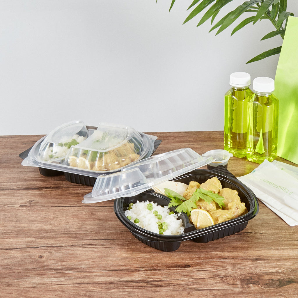 Chef 101 28 oz Oval Black Plastic Food Container - with Clear Lid, 2 Compartments, Microwavable - 9 1/2" x 8" x 2 3/4" - 50 count box