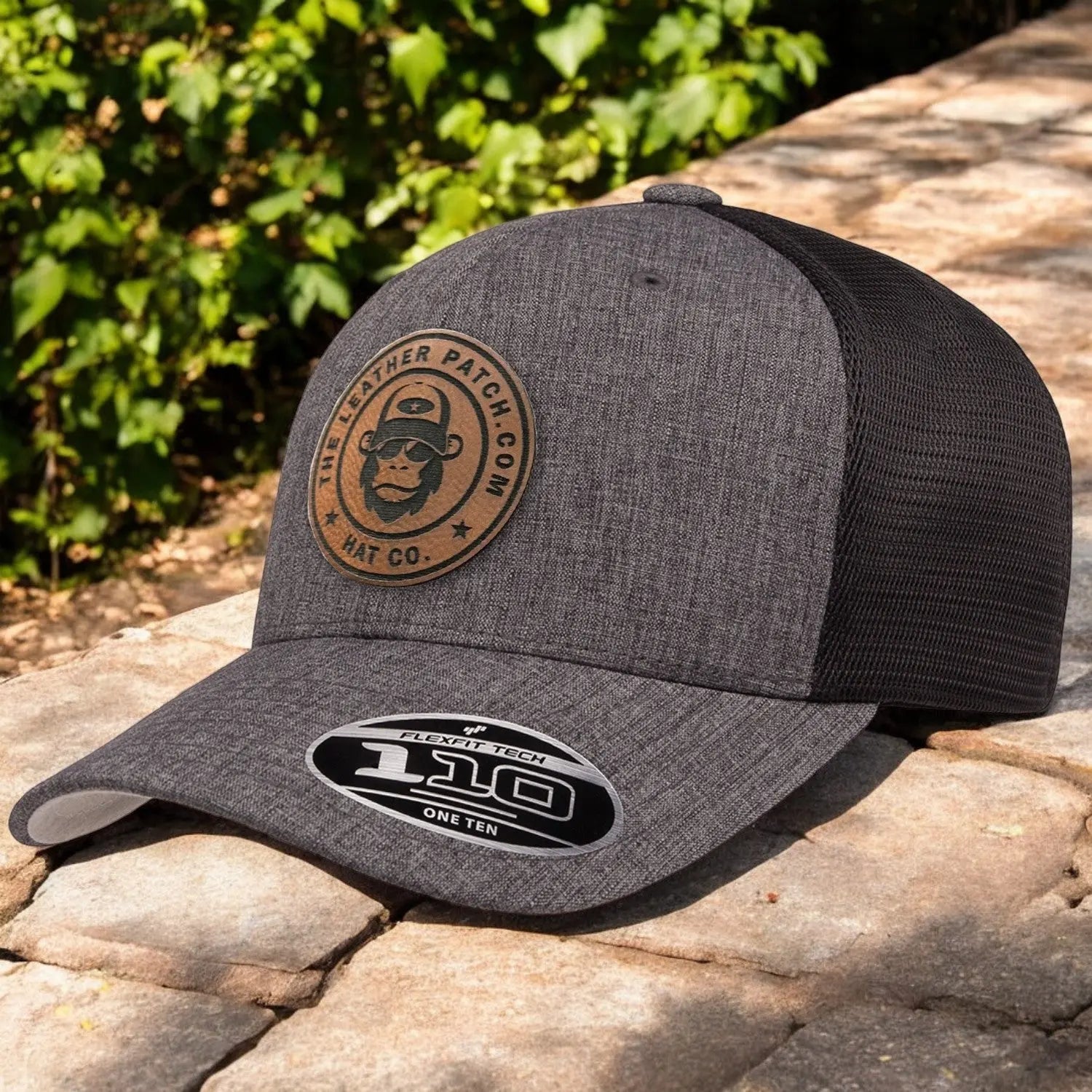 FlexFit 110 Trucker Hat + Leather Patch